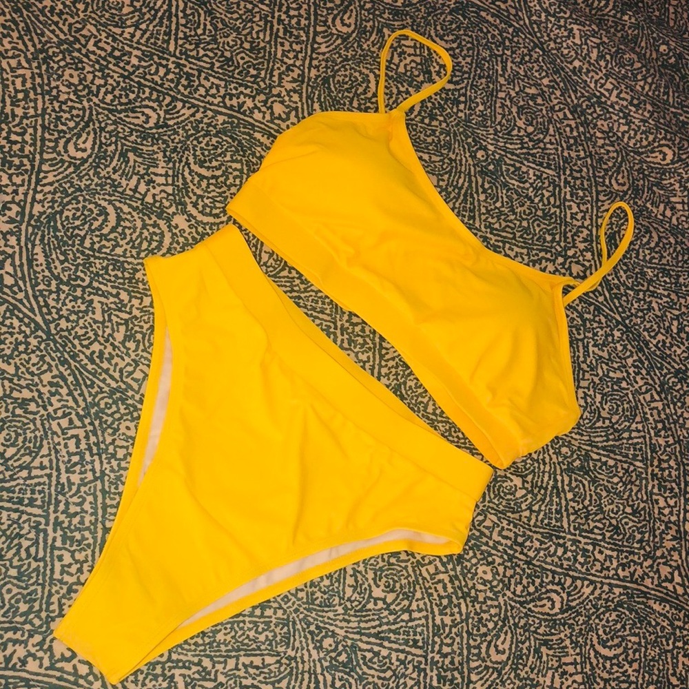 Yellow 2 piece, w/high waisted high cut leg.